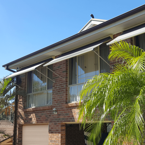 S200 Pivot Arm Awnings on Two Story House